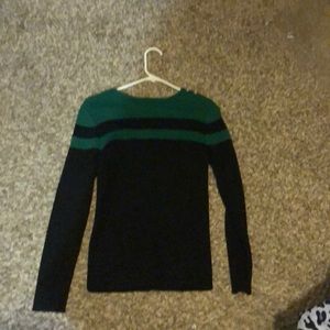 green and black tube sweater
